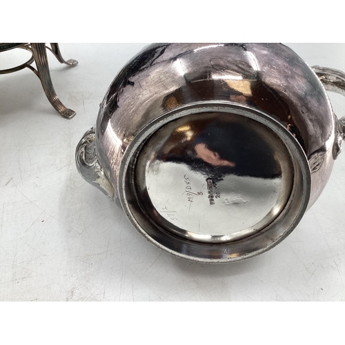 63 - Collection of silver plated wares to include kettle on burner, ornately decorated teapot and small g... 