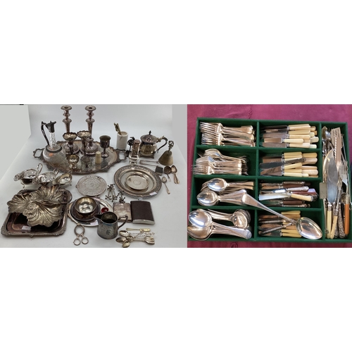 66 - Large collection of silver plated ware to include flatware candlesticks, sauceboats, white metal mou... 