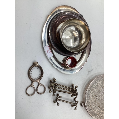 66 - Large collection of silver plated ware to include flatware candlesticks, sauceboats, white metal mou... 