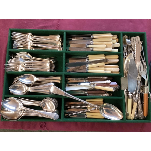 66 - Large collection of silver plated ware to include flatware candlesticks, sauceboats, white metal mou... 