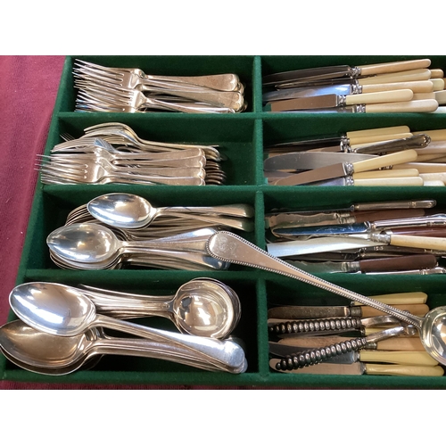 66 - Large collection of silver plated ware to include flatware candlesticks, sauceboats, white metal mou... 