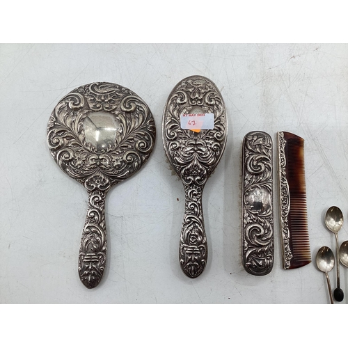 67 - Collection of Stirling silver items to include a dressing set, collection of coffee spoons with bean... 