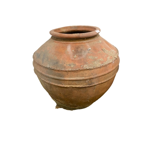 74 - Four similar terracotta bulbous pots, tallest approx. 55cm H, all with some wear and rustic, see ima... 