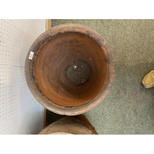 75 - Two tall terracotta pots, 68cmH & 58cmH, with wear and some chips etc