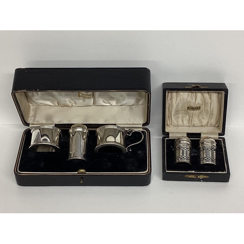 91 - Boxed sterling silver cruet set, and a boxed sterling silver pepperettes