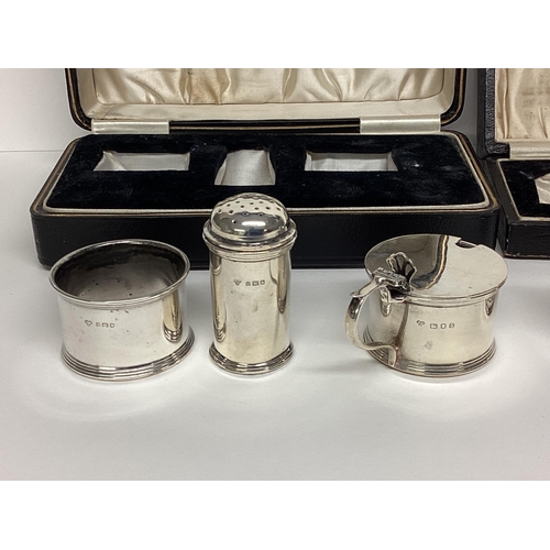 91 - Boxed sterling silver cruet set, and a boxed sterling silver pepperettes