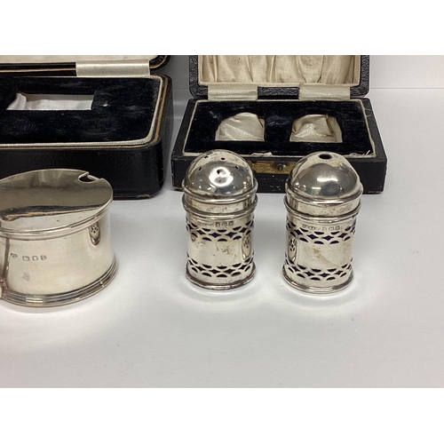 91 - Boxed sterling silver cruet set, and a boxed sterling silver pepperettes