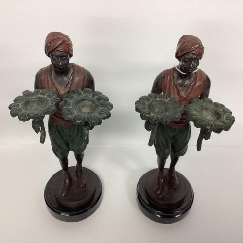 92 - Pair of Bergman style north African bronze figures, engraved to base Bergman, on circular hardstone ... 