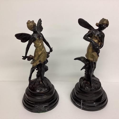 92 - Pair of Bergman style north African bronze figures, engraved to base Bergman, on circular hardstone ... 