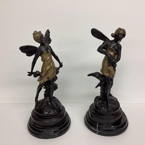 92 - Pair of Bergman style north African bronze figures, engraved to base Bergman, on circular hardstone ... 