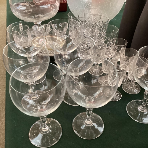 96 - Large collection of C20th glassware to include crystal glass tumblers a Loetz style rosebowl and num... 