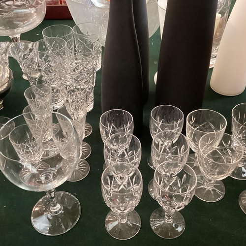 96 - Large collection of C20th glassware to include crystal glass tumblers a Loetz style rosebowl and num... 