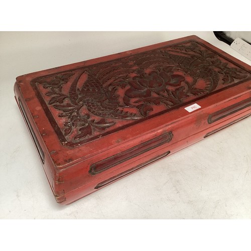 284 - A large Chinese C19th style oblong lacquer box with stylised flora and fauna decoration, 60 x 35 x 1... 