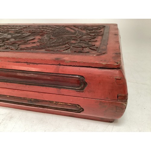 284 - A large Chinese C19th style oblong lacquer box with stylised flora and fauna decoration, 60 x 35 x 1... 