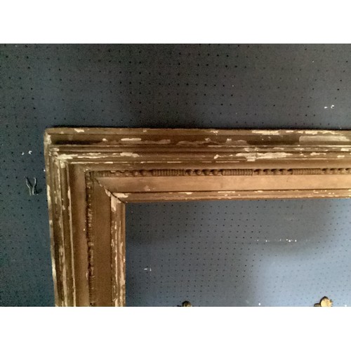 386 - Large gilt picture frame, with much wear 129cmH x 157cmW