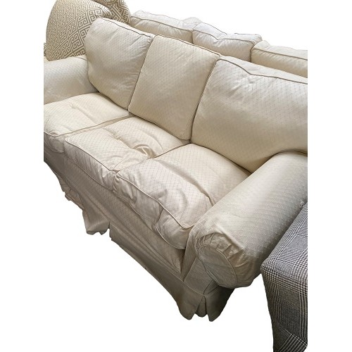 447 - Pair of cream upholstered three seater sofas, 225cmL, with some wear, sold as seen (2 sofas)