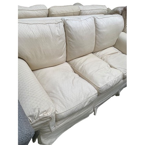 447 - Pair of cream upholstered three seater sofas, 225cmL, with some wear, sold as seen (2 sofas)