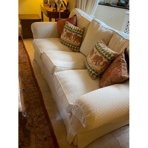 447 - Pair of cream upholstered three seater sofas, 225cmL, with some wear, sold as seen (2 sofas)