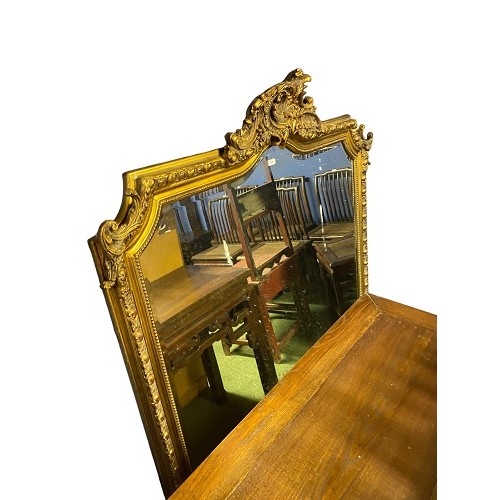 318 - A large modern gilt framed wall mirror, with shell finial, 152H, 124W cm approx.