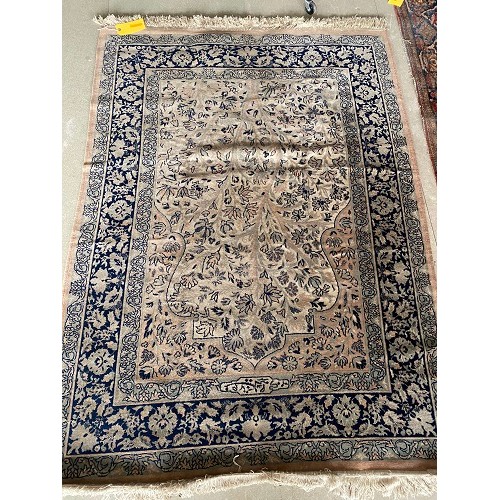 392 - Two art silk Indian rugs, larger (202 x 301) and smaller (180x126), both with some wear