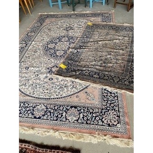 392 - Two art silk Indian rugs, larger (202 x 301) and smaller (180x126), both with some wear