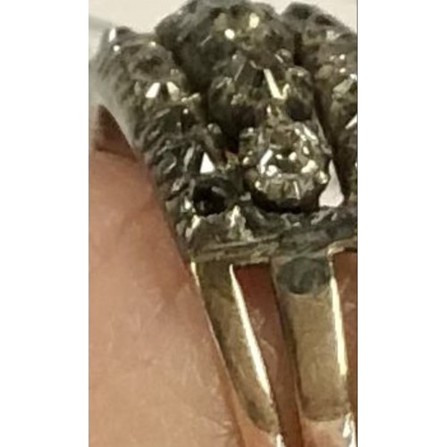 42 - A C19th unmarked yellow metal and diamond ring set throughout with the three lines of an old cut dia... 