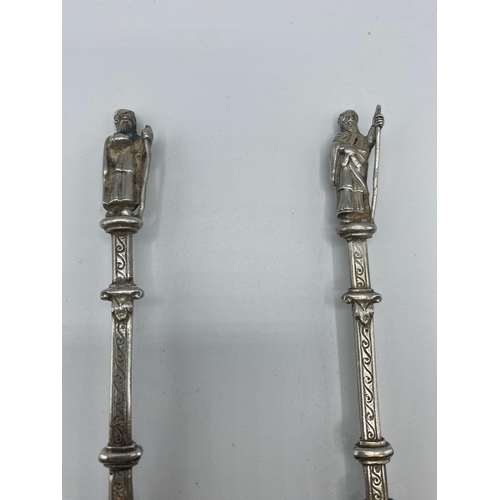 141 - A pair of Sterling silver Apostle spoons by Lou Lansberg, London 1891, 140g