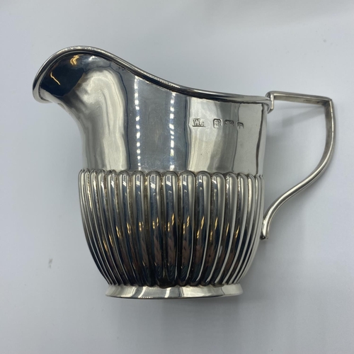 18 - Three piece sterling silver tea set, by William Adams, Birmingham, 1916, 850 grams