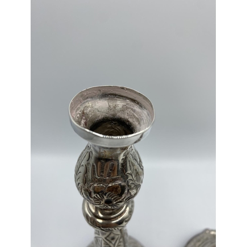 27 - A pair of Solid Silver candlesticks by J Zeving Zweig, London 1914, 350g