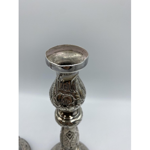 27 - A pair of Solid Silver candlesticks by J Zeving Zweig, London 1914, 350g