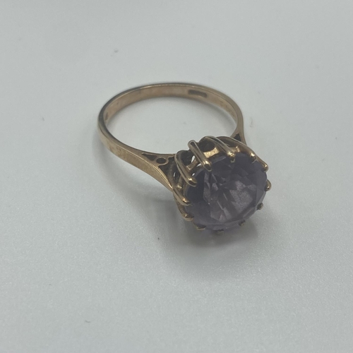 28 - A 9ct gold and amethyst single stone ring, circular round cut Amethyst in a 12 claw setting, 2.8g