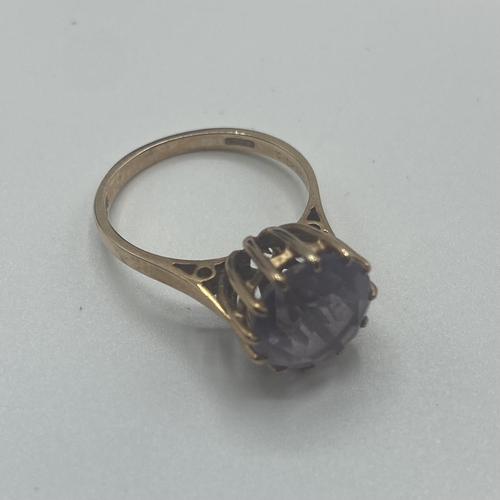 28 - A 9ct gold and amethyst single stone ring, circular round cut Amethyst in a 12 claw setting, 2.8g