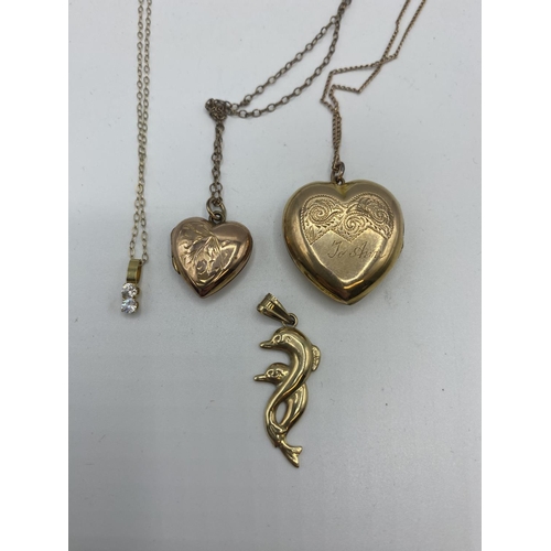 32 - A collection of 9ct gold items to include two heart lockets, chains and pendant 18g