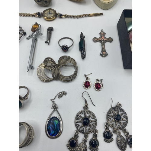 33 - A collection of silver , white metal and costume jewellery /watches to include an unmarked yellow me... 