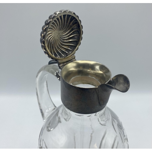 60 - A sterling silver topped claret jug by Sampson Morden & Co.  London 1886 24cm H