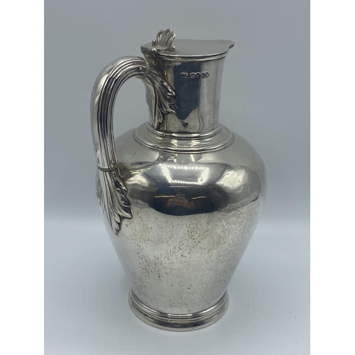 7 - Sterling silver lidded jug, on circular stepped foot, by John Wilmin Figg, London, 1837, 21.5otz