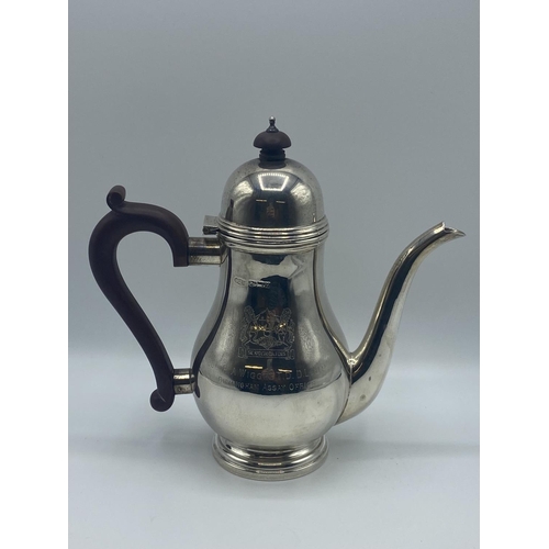 8 - Sterling silver coffee pot, with domed top, fruitwood handle on circular stepped base, by John Charl... 