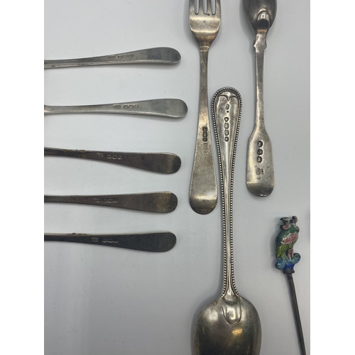 85 - Quantity of silver teaspoons, and two silver plate teapots, and cocktail sticks