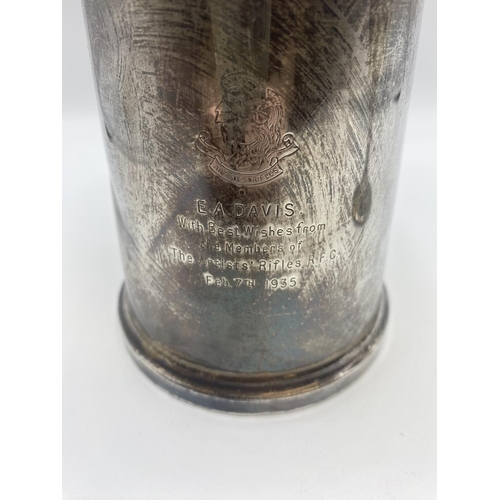 89 - A sterling silver mug with glass bottom. Birmingham 1934. Together with a white metal wine goblet, a... 