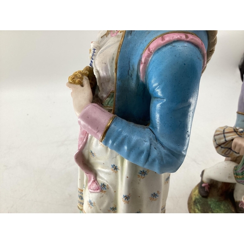 205 - A pair of Continental painted bisque porcelain figures of a man and woman, approx 47cm high. Impress... 