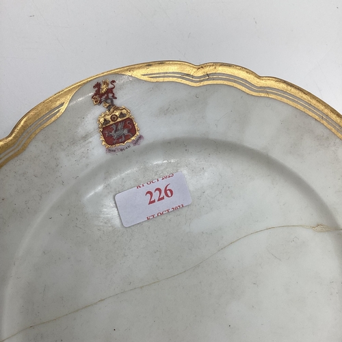 226 - Four C19th French porcelain plates, gilt borders with crest, retailed by Cajoche Et Pannier A Lascal... 