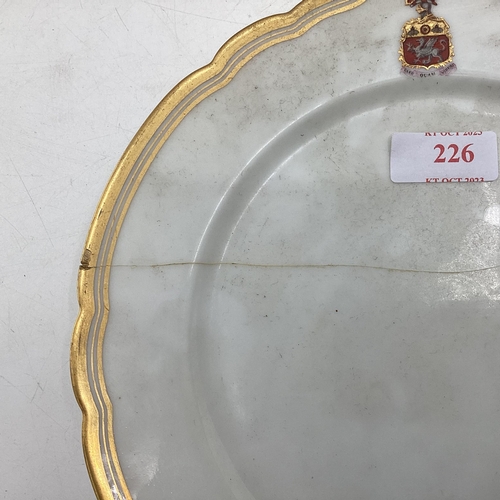 226 - Four C19th French porcelain plates, gilt borders with crest, retailed by Cajoche Et Pannier A Lascal... 