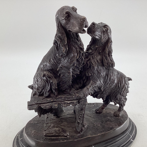 260 - A bronze model of a pair of spaniels, indistinct etched signature, possibly Aaure, on an oval marble... 