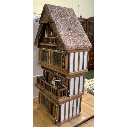 270 - A vintage dolls house, fitted interior some furniture 90cm x 48cm