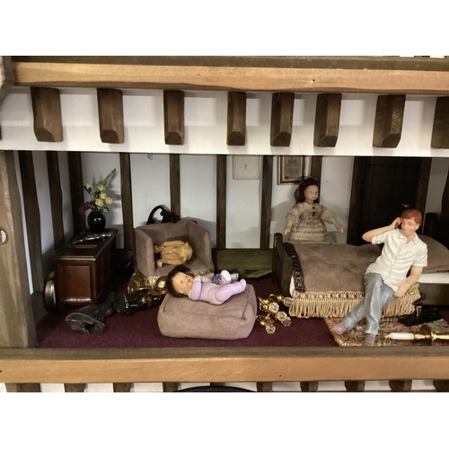 270 - A vintage dolls house, fitted interior some furniture 90cm x 48cm