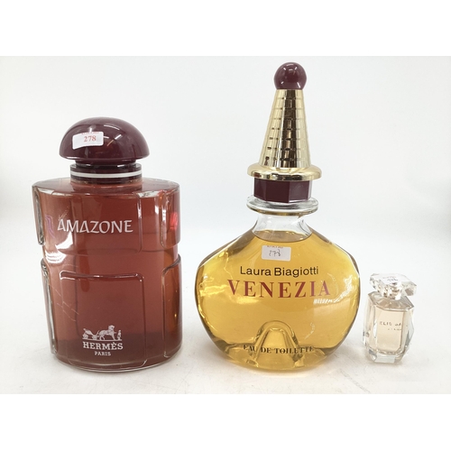 278 - Two shop display perfume Factice bottles, Hermes, Venezia and a small example of Ellie Sarr largest ... 