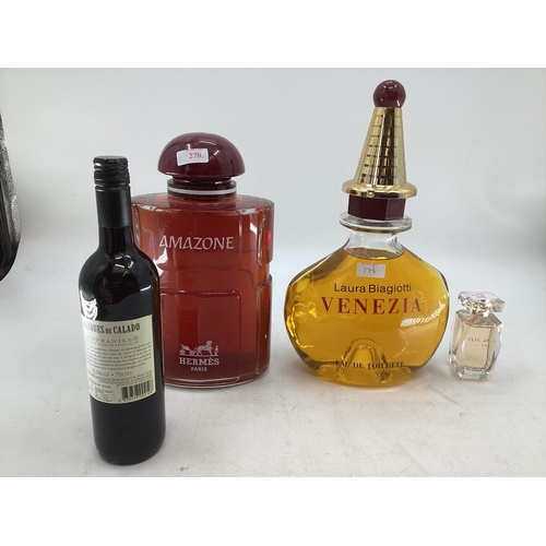 278 - Two shop display perfume Factice bottles, Hermes, Venezia and a small example of Ellie Sarr largest ... 
