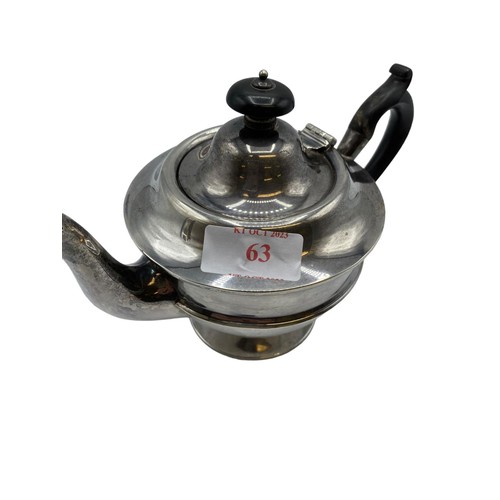 63 - A Sterling Silver bachelors teapot with ebonised handle. Birmingham 1900. 285g