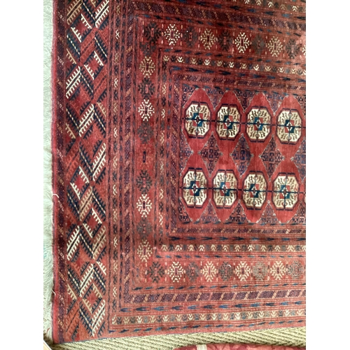 680 - Persian style rug, red ground, with tears and losses 130cm x 295cm]