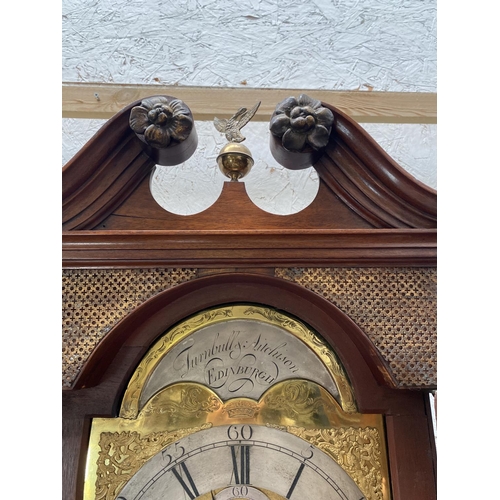 196 - A mahogany long case clock, the silvered and brass arched dial with black Roman numerals, inscribed ... 